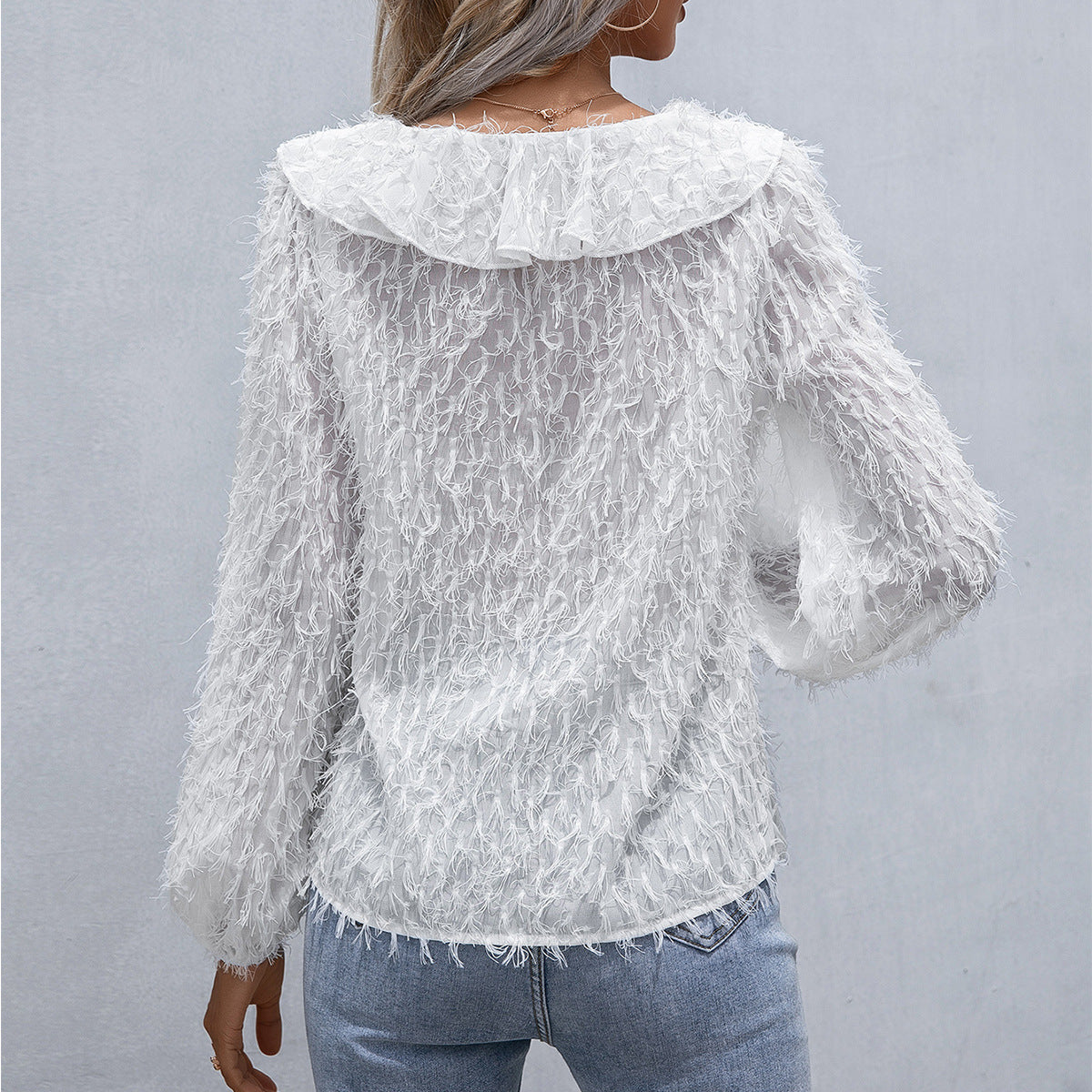 Lilia - Blusa con volantes de plumas